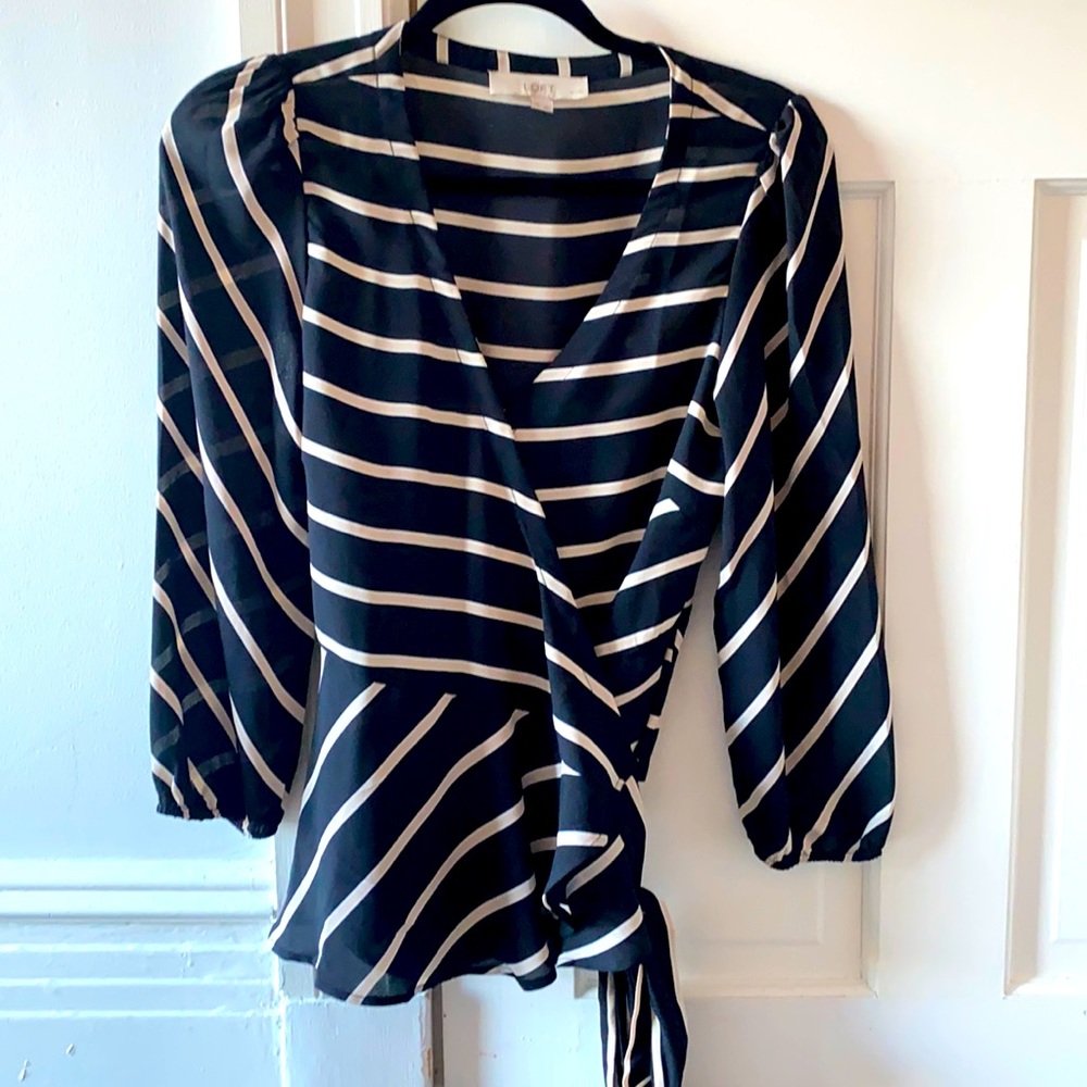 Black and beige striped peplum style blouse